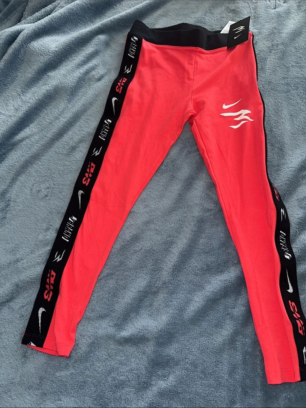 Nike Girls Coral Pink Leggings with Black Logo Tape